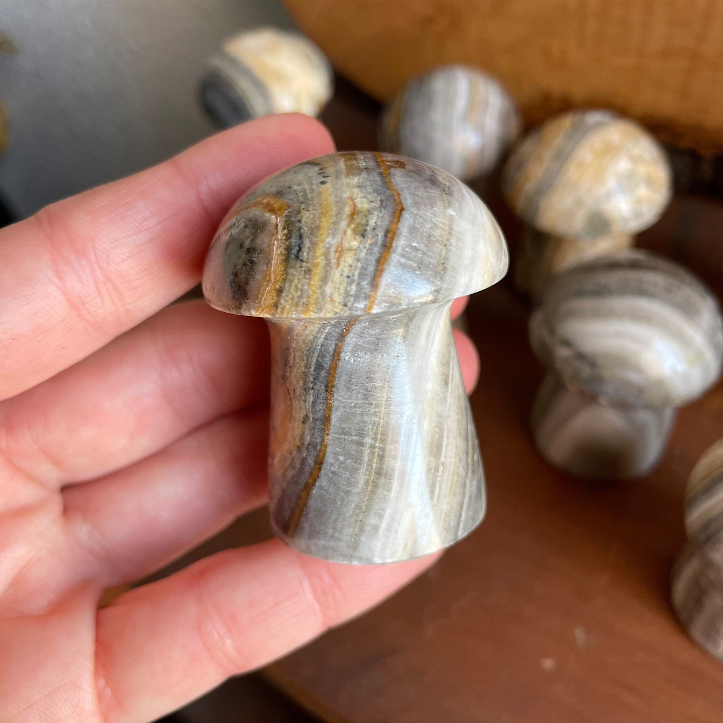 Immerse yourself in the soothing energy of Zebra Calcite with our captivating Mushroom. Let its mesmerizing stripes and earthy hues elevate your meditation and crystal grid experiences.