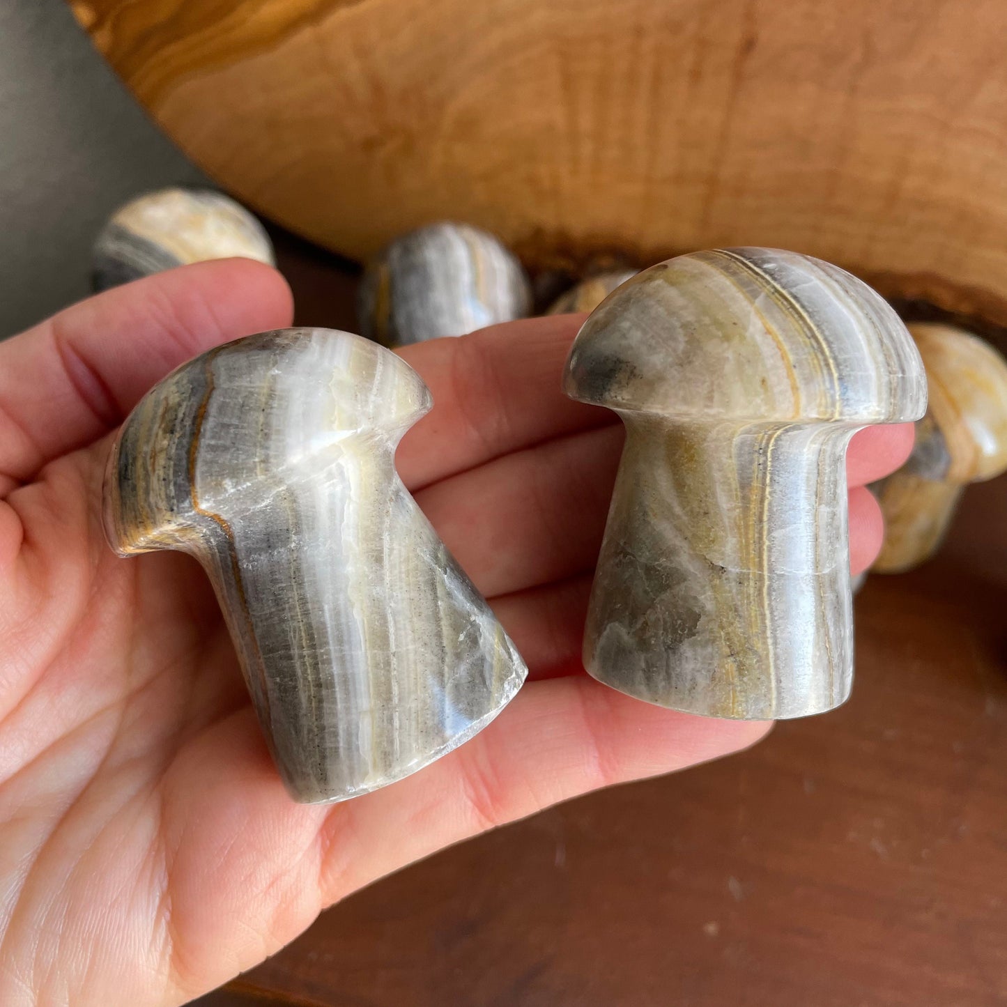 Experience the calming influence of Zebra Calcite in our visually striking Mushroom form. Perfect for crystal gridding or display, its earthy tones and distinctive stripes create a tranquil atmosphere.
