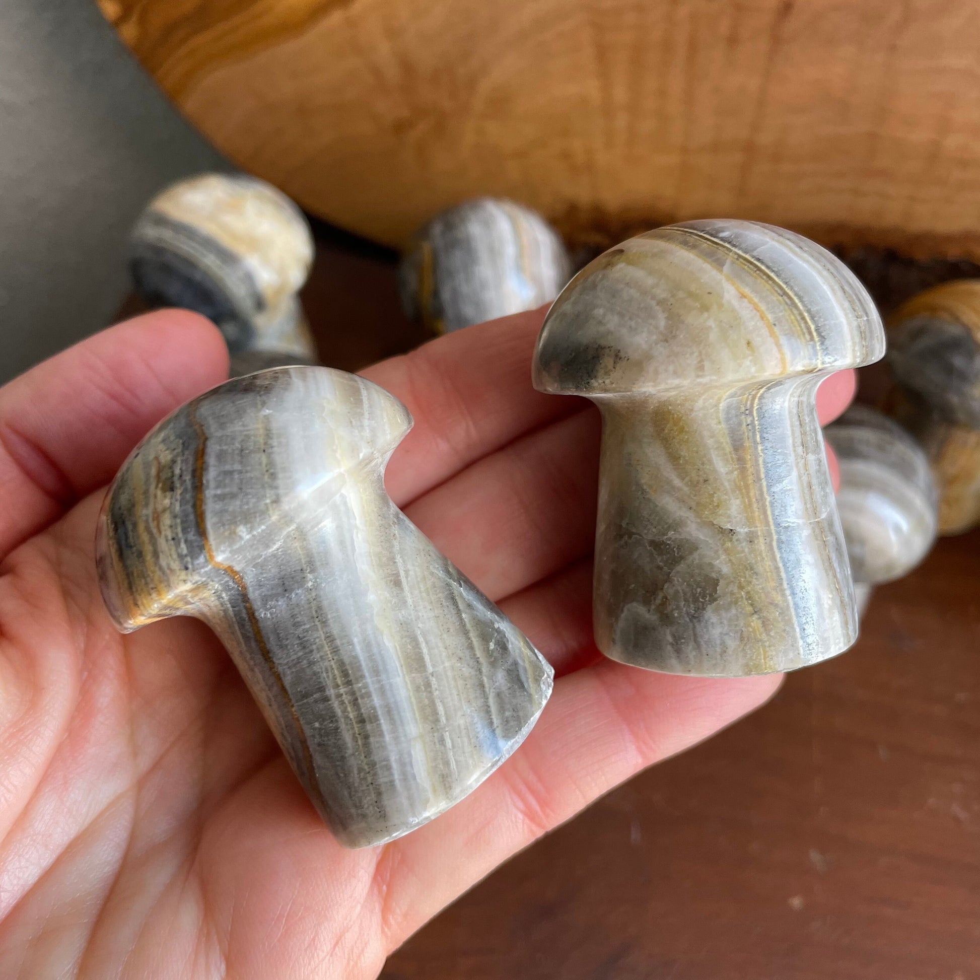 Embrace the calming presence of Zebra Calcite with our elegant Mushroom. Its earthy hues and mesmerizing stripes make it a perfect choice for enhancing your meditation and energy practices.